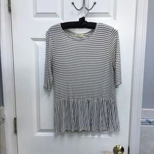 White and black peplum shirt